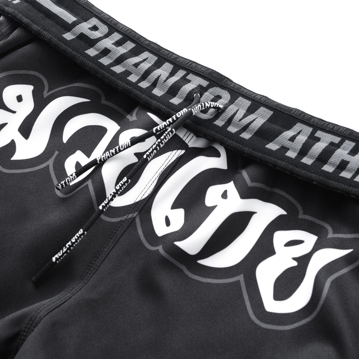 Fightshorts REVOLUTION Muay Thai - Schwarz