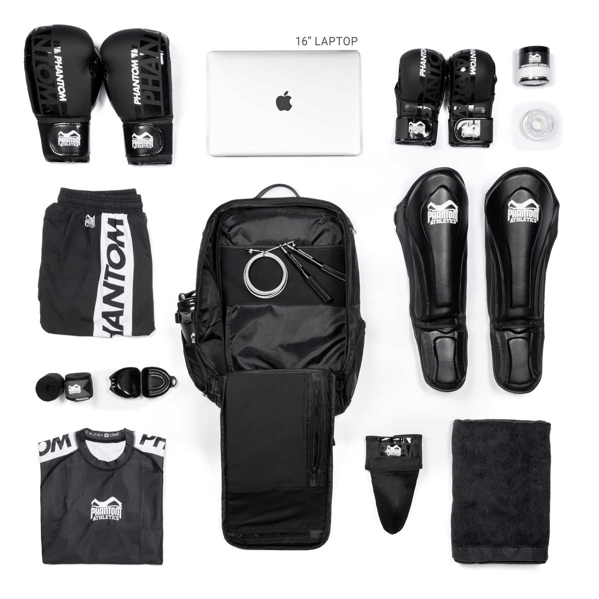 Phantom Athletics Rucksack Apex Team, ideal für Kampfsportler und Wettkämpfer. Dieser geräumige Rucksack bietet ausreichend Platz für Boxhandschuhe, Ringerschuhe, Trainingskleidung, Schutzausrüstung und weiteres Zubehör, perfekt für Training und Turniere.