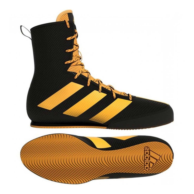 Adidas Box Hog 3 Schwarz/Gold – Leichter Boxschuh mit atmungsaktivem Mesh-Obermaterial für optimale Belüftung. Entwickelt für Boxer, die Geschwindigkeit und Präzision im Ring benötigen.